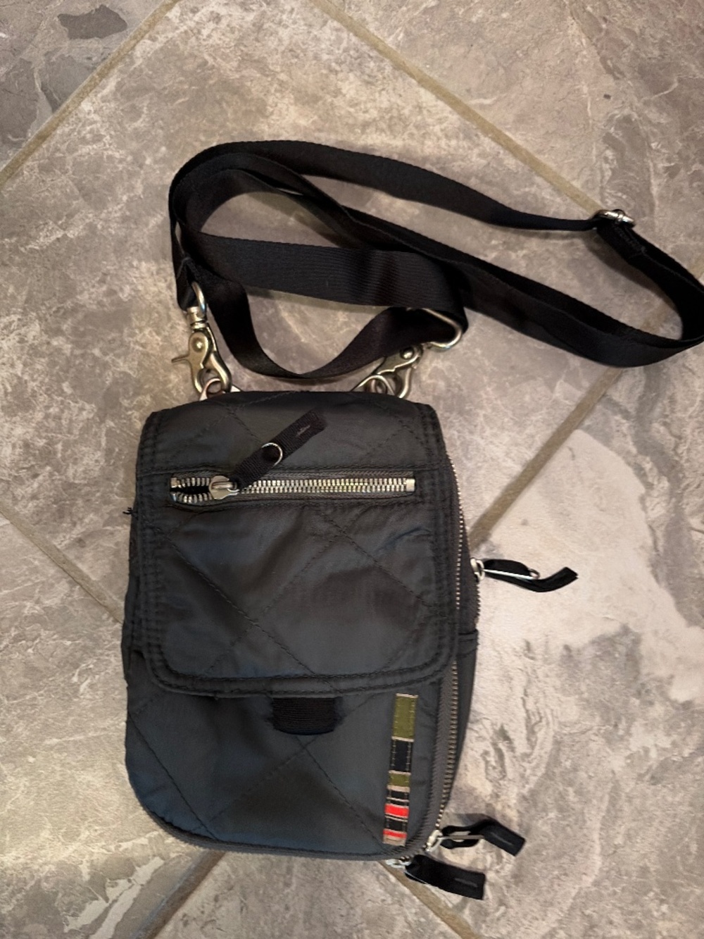 Small crossbody bag with several pockets